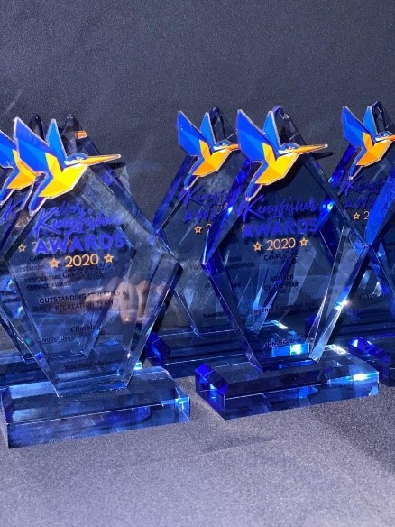 The Kingfisher Awards 2020 acrylic trophies placed or lined up in rows and next to each other. 
