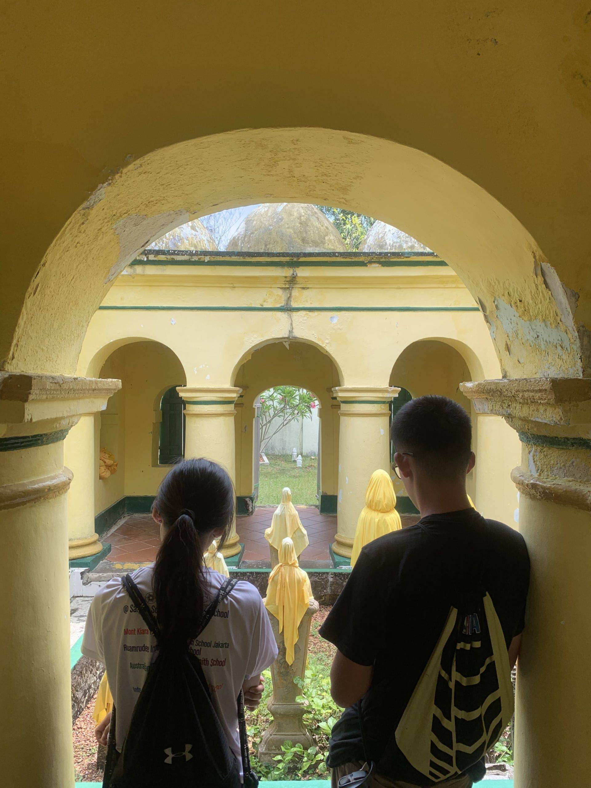 Bintan LAB trip where students are resting on a site