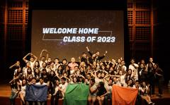 Orientation group shot on the stage